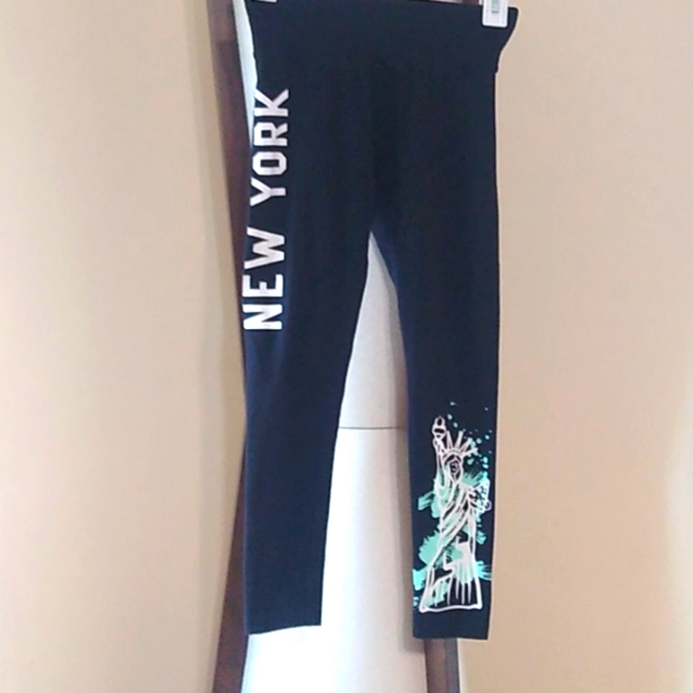 Never worn size 10 Justice NY Leggings